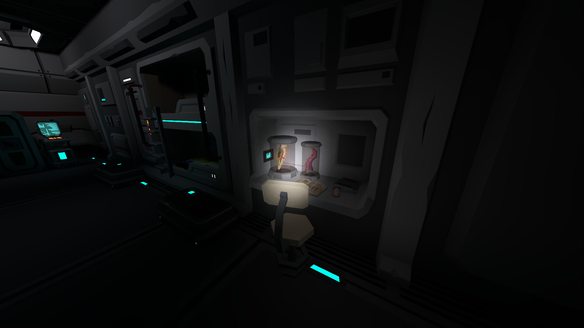 Dimly lit crew quarters workstation in a low-poly spaceship; a desk light spotlights a chair, open logbook, mug, and monitor, with two glass specimen jars containing alien biological matter, while a dark bunk bed with cyan accents is visible in the background.